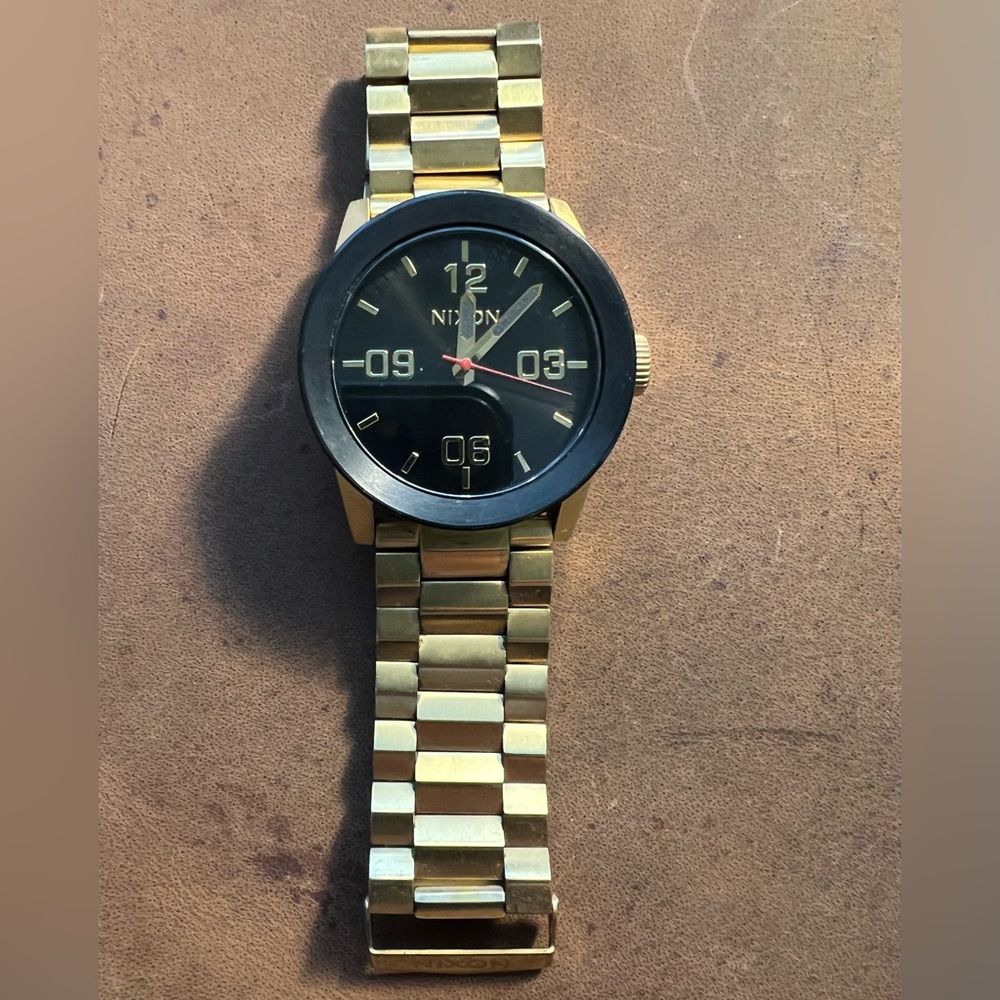 Nixon men’s Private Stainless Steel gold watch